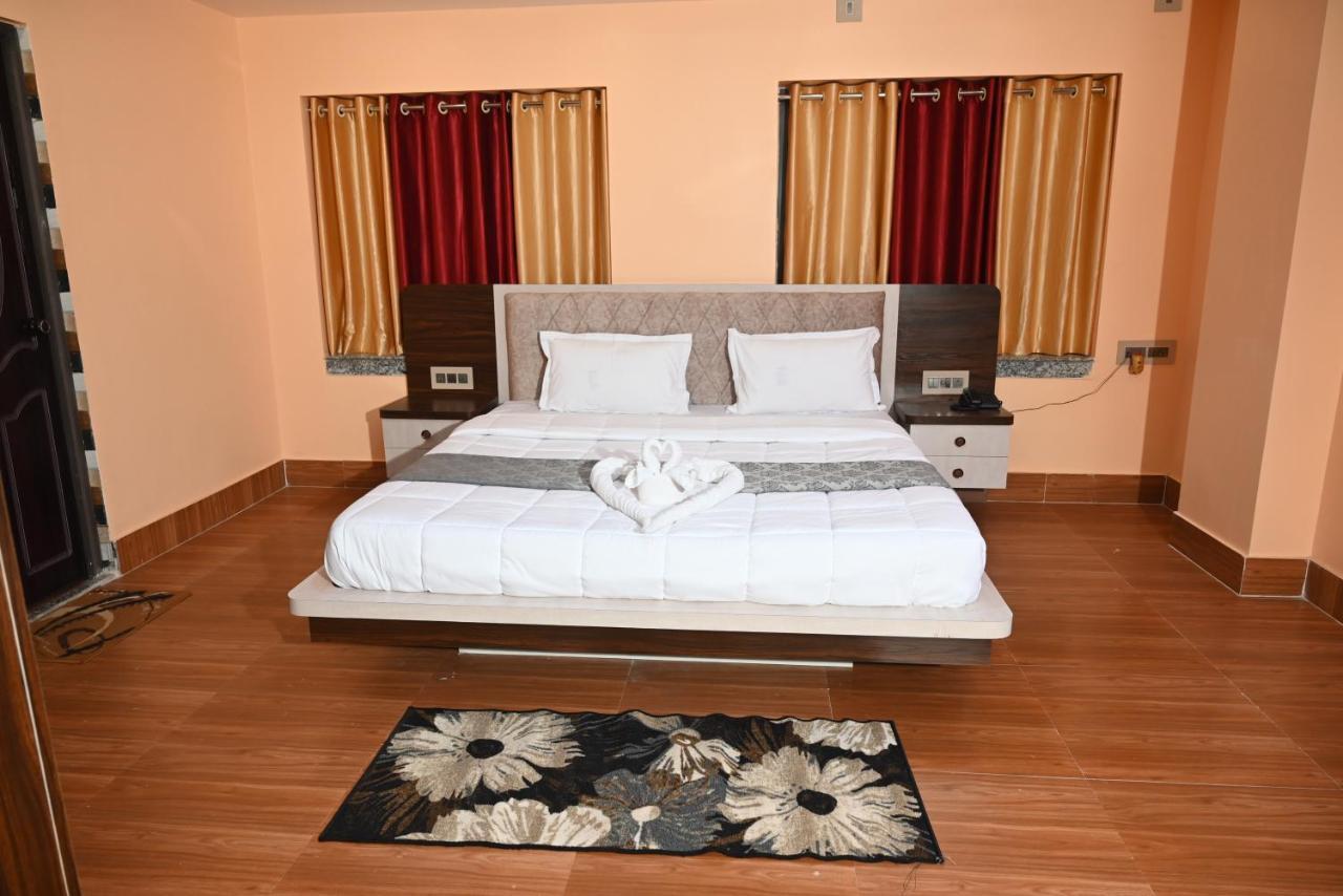 Oyo Hotel Tulusi Inn Bolpur Bagian luar foto