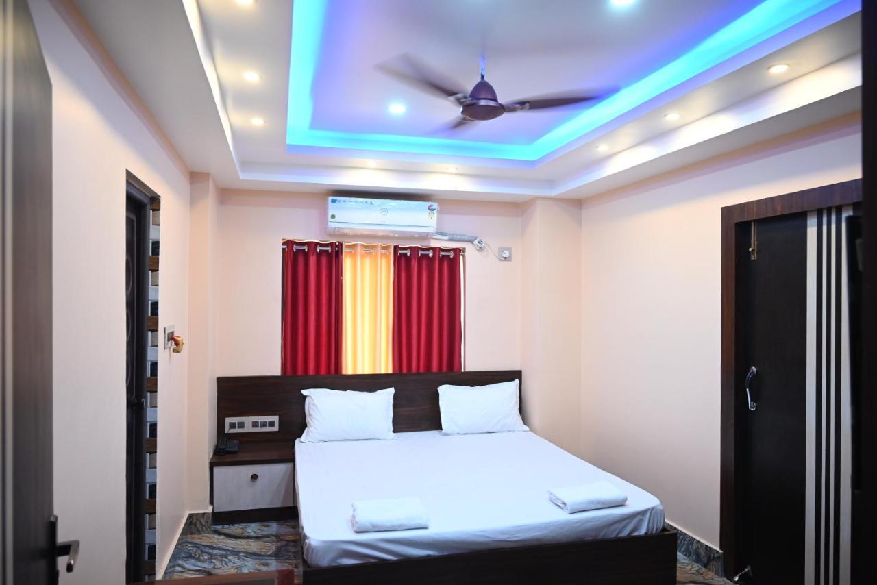 Oyo Hotel Tulusi Inn Bolpur Bagian luar foto