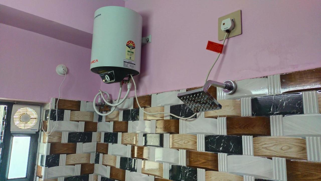 Oyo Hotel Tulusi Inn Bolpur Bagian luar foto